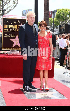 British producer and actor David Hunt and his wife Patricia Heaton pose during Heaton's star ceremony on the Hollywood Walk of Fame in Hollywood, California, USA 22 May 2012. Heaton was awarded the 2,472nd star on the Hollywood Walk of Fame in the television category. Photo: Hubert Boesl Stock Photo