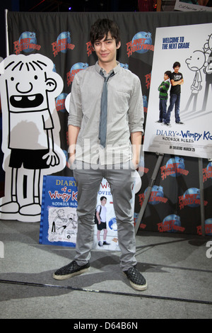 Devon Bostick Stars of 'Diary Of A Wimpy Kid: Rodrick Rules' visit Planet Hollywood Times Square New York City, USA - 16.03.11 Stock Photo