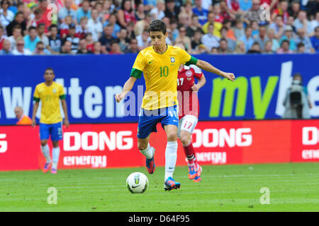 Brazil's Oscar controls the ball during the international friendly soccer match between Denmark and Brazil at Imtech Arena in Hamburg, Germany, 26 may 2012. Photo: Revierfoto Stock Photo