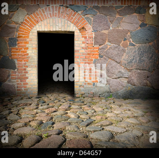 Old architecture stone house with black wooden door Stock Photo - Alamy