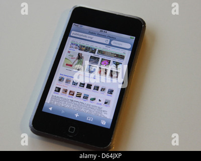 The Apple iPod Touch 8GB with Wi-Fi offers a compact, portable music and entertainment experience. It is a popular device for those seeking mobile multimedia access on the go. Stock Photo