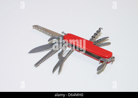 The Swiss Army Knife is a versatile multi-tool, known for its practicality in various outdoor and emergency situations. It includes a range of tools such as a blade, screwdriver, and can opener. Stock Photo