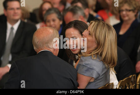 United States Vice President Joe Biden chats with Barbara Bush (blond hair) and Jenna Bush-Hager (dark hair) at the unveiling ceremony of the official White House portraits of their parents, former U.S. President George W. Bush and first lady Laura Bush at the White House in Washington DC, Thursday, May 31, 2012. .Credit: Chris Kleponis / CNP Stock Photo