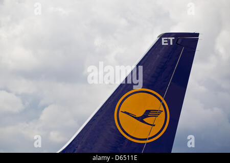 A view of the tail fin of an aircraft with the logo of German carrier Lufthansa on it at the airport in Nuremberg, Germany, 9 May 2012. Photo: Daniel Karmann Stock Photo