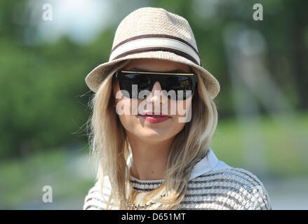 Lena Gercke, girlfriend of Germany's Sami Khedira, arrives at Lviv airport, the Ukraine, 09 June 2012, ahead of the Group B preliminary round match of the UEFA EURO 2012 between Germany and Portugal in Lviv, Ukraine on 09 June 2012. Photo: Andreas Gebert dpa Stock Photo