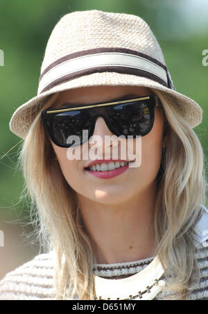 Lena Gercke, girlfriend of Germany's Sami Khedira, arrives at Lviv airport, the Ukraine, 09 June 2012, ahead of the Group B preliminary round match of the UEFA EURO 2012 between Germany and Portugal in Lviv, Ukraine on 09 June 2012. Photo: Andreas Gebert dpa Stock Photo