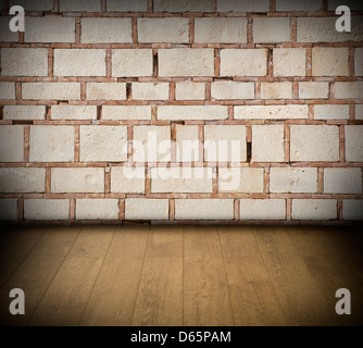 Old brick wall texture with wooden floor background Stock Photo