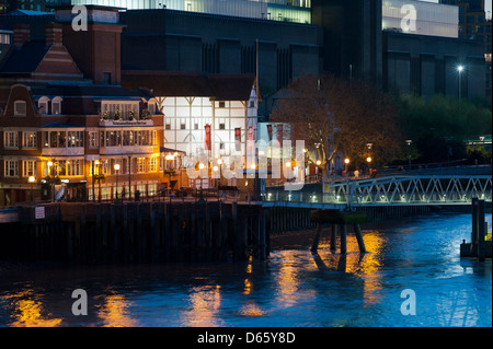 The Globe Theatre and Shakespeare Centre on the south bank of the River Thames in London, UK, at dusk. Stock Photo