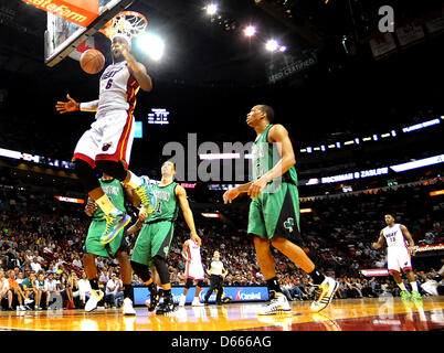 April 12, 2013 - Miami, FL - Florida, USA - United States - Miami--- fl-heat-celtics-041213b---The Miami Heat host the Boston Celtics at American Airlines Arena.  LeBron James finishes a monster dunk in the first half.              Robert Duyos,  Sun Sentinel (Credit Image: Credit:  Sun-Sentinel/ZUMAPRESS.com/Alamy Live News) Stock Photo