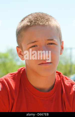 Teenage boy sad and depressed up close Stock Photo