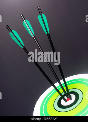 Three Blue Black Archery Arrows Hit Round Target Bullseye Center Stock ...