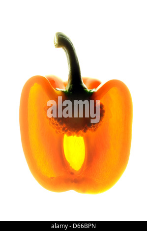 Yellow pepper cut in half, back lit. Stock Photo