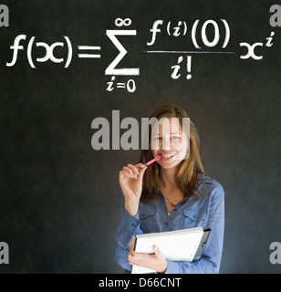 Learn Math or Maths confident beautiful woman teacher chalk blackboard background Stock Photo