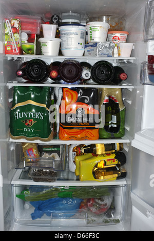 Inside a large fridge full of alcohol and food products Stock Photo ...