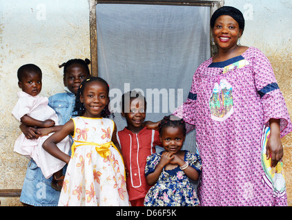 Family with pregnant African woman with five daughters Stock Photo