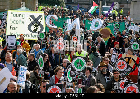 Glasgow, Scotland, United Kingdom  13 April 2013. Anti Nuclear weapons and Anti Trident march and demonstration beginning in George Square, Glasgow, Scotland and parading round the city centre before ending in a rally back at George Square. Approximately 5000 campaigners attended from all over the UK and representing  different anti nuclear organisations. This was a march to organise support for a mass sit-in at  Naval base on Monday 15th April 2013. Credit: Findlay/Alamy Live News Stock Photo
