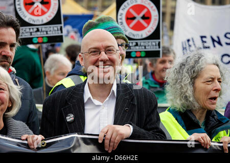 Glasgow, Scotland, United Kingdom  13 April 2013. Anti Nuclear weapons and Anti Trident march and demonstration beginning in George Square, Glasgow, Scotland and parading round the city centre before ending in a rally back at George Square. Approximately 5000 campaigners attended from all over the UK and representing  different anti nuclear organisations. This was a march to organise support for a mass sit-in at  Faslane Naval base on Monday 15th April 2013. Patrick Harvie MSP and convener of the Scottish Green Party pictured on the font line of the protest.  Credit: Findlay/Alamy Live News Stock Photo