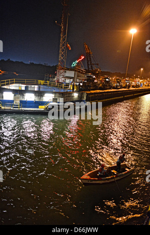 The Panama Canal, with its 48-mile ship canal in Panama, connects the Atlantic Ocean to the Pacific Ocean. Stock Photo