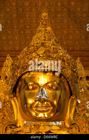 Face of the Mahamuni Buddha, Mahamuni Pagoda, Mandalay, Myanmar, (Burma) Stock Photo