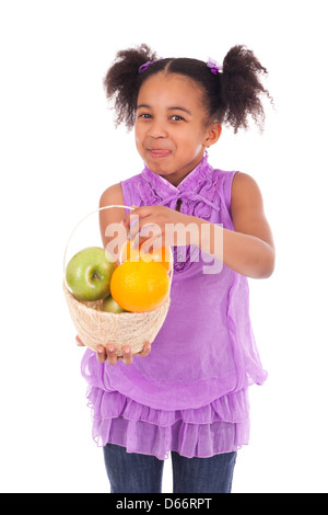 Little African girl with baket fruit Stock Photo