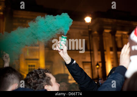 London, UK. Saturday 13th April 2013 A green smoke flare was let off by one of the party revelers. The party had been planned for the first Saturday after the former prime ministers death. Nelson Pereira/Alamy Live News Stock Photo