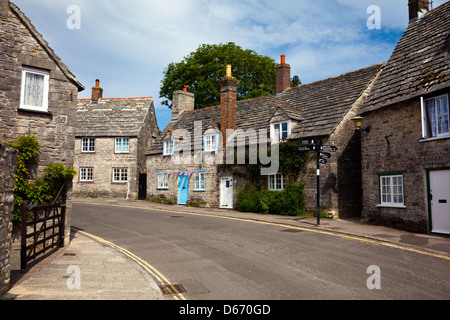 Cottages in the local Purbeck stone in Corfe Castle village, Dorset ...