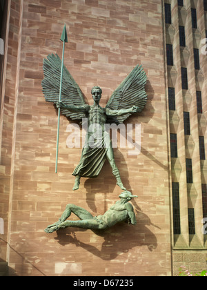 Coventry Cathedral of St Michael: giant bronze statue of St. Michael subduing the Devil by sculptor Jacob Epstein Stock Photo