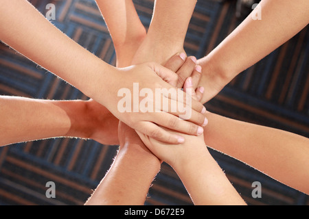 Group of hands, team work, family love, support, help, charity Stock Photo