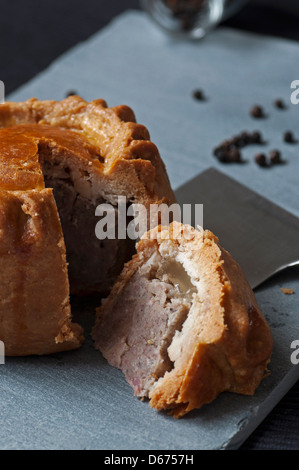 Handmade Melton Mowbray Pork Pie. Stock Photo