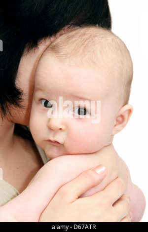 Beautiful baby in mother's hands Stock Photo