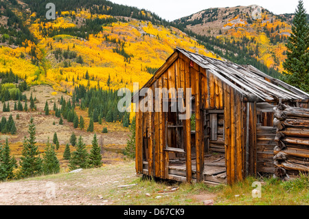 Banker mine flanked with autumn foliage, Sawatch Range, Colorado. Stock Photo