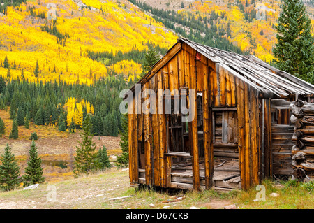 Banker mine flanked with autumn foliage, Sawatch Range, Colorado. Stock Photo