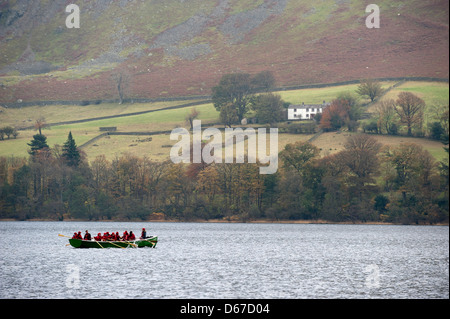 Young school children canoeing on Ullswater in the English Lake District. Stock Photo