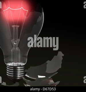 Broken red light bulb against black background Stock Photo