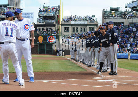 Kyuji Fujikawa (Cubs), Norichika Aoki (Brewers), APRIL 8, 2013 - MLB : Kyuji Fujikawa #11 (L) of the Chicago Cubs shakes hands with Cubs manager Dale Sveum as Norichika Aoki #7 (2nd R) of the Milwaukee Brewers watches them next to Brewers manager Ron Roenicke during introductions before the baseball game at Wrigley Field in Chicago, Illinois, United States. (Photo by AFLO) Stock Photo