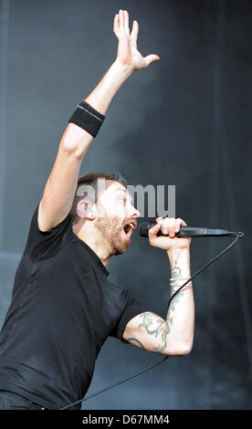 Tim McIlrath, front man of US punk band Rise Against performs on stage during the Hurrican Festival in Scheessel, Germany, 23 June 2012. The sold-out festival takes place until 24 June and is attended by 73 000 visitors. Photo: Daniel Reinhardt Stock Photo
