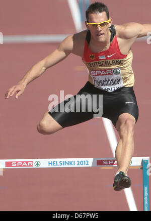 German hurdler Georg Fleischhauer competes in the heats of the 400 m hurdles event at the European Athletics Championships 2012 at the Olympic Stadium in Helsinki, Finland, 27 June 2012. The European Athletics Championships take place in Helsinki from the 27 June to 01 July 2012. Photo: Michael Kappeler dpa Stock Photo