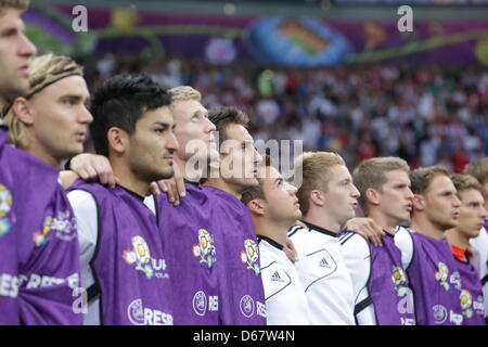 Germany's players sing the national anthem during the UEFA EURO 2012 semi-final soccer match Germany vs. Italy at the National Stadium in Warsaw, Poland, 28 June 2012. Photo: Jens Wolf dpa (Please refer to chapters 7 and 8 of http://dpaq.de/Ziovh for UEFA Euro 2012 Terms & Conditions) Stock Photo