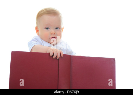 Little boy reads a big book Stock Photo