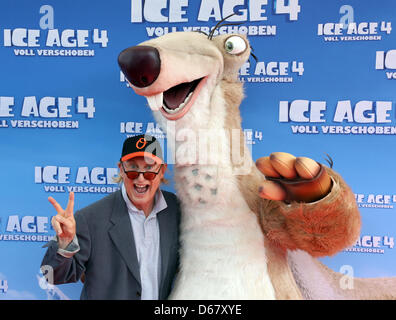 Comedian Otto Waalkes and the character Sid arrives for the premiere of 'Ice Age: Continental Drift' in Berlin, Germany, 30 June 2012. The fourth part of the movie will be aired to German cinemas on 02 July 2012.  Photo: Stephanie Pilick Stock Photo