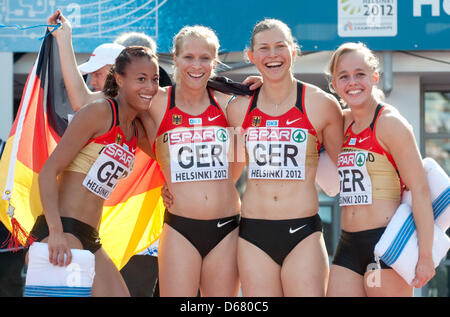 Tatjana Pinto (L-R), Verena Sailer, Anne Cibis and  Leena Guenther of Germany celebrate after winning the women's 4x100 m Relay final at the European Athletics Championships 2012 at Olympic Stadium in Helsinki, Finland, 01 July 2012. The European Athletics Championships take place in Helsinki from the 27 June to 01 July 2012. Photo: BERND THISSEN Stock Photo