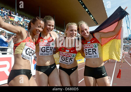 Tatjana Pinto (L-R), Anne Cibis, Verena Sailer and Leena Guenther of Germany celebrate after the women's 4x100 m Relay final at the European Athletics Championships 2012 at Olympic Stadium in Helsinki, Finland, 01 July 2012. The European Athletics Championships take place in Helsinki from the 27 June to 01 July 2012. Photo: Bernd Thissen dpa  +++(c) dpa - Bildfunk+++ Stock Photo