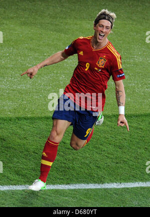 Spain's Fernando Torres celebrates after scoring the 3-0 during the UEFA EURO 2012 final soccer match Spain vs. Italy at the Olympic Stadium in Kiev, Ukraine, 01 July 2012. Photo: Thomas Eisenhuth dpa (Please refer to chapters 7 and 8 of http://dpaq.de/Ziovh for UEFA Euro 2012 Terms & Conditions)  +++(c) dpa - Bildfunk+++ Stock Photo