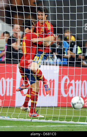 Spain's Cesc Fabregas (L) and David Silva celebrate the 1-0 goal during the UEFA EURO 2012 final soccer match Spain vs. Italy at the Olympic Stadium in Kiev, Ukraine, 01 July 2012. Spain won 4-0. Photo: Revierfoto Stock Photo