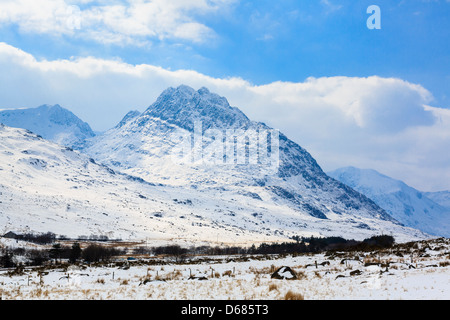 Wintry view to Mount Tryfan mountain east face with late snow in spring 2013 in Snowdonia National Park, Ogwen Valley, Conwy, North Wales, UK Stock Photo