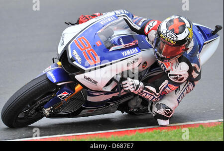 Spanish MotoGP racer Jorge Lorenzo from team Yamaha Factory Racing practices for the German Grand Prix on the Sachsenring in Hohenstein-Ernstthal, Germany, 06 July 2012. Photo: HENDRIK SCHMIDT Stock Photo