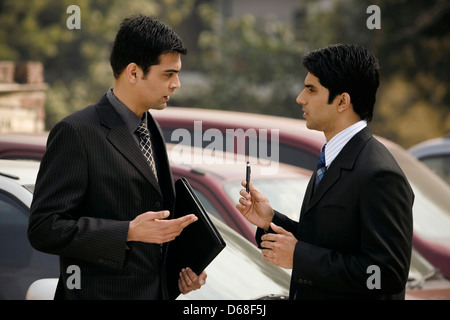 Businessmen having a discussion Stock Photo
