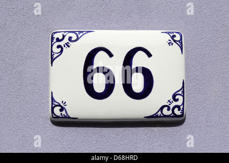 number sixty-six, house address plate number Stock Photo