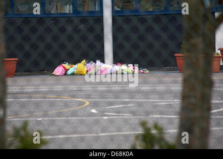 Parkstone, Poole, Dorset, UK Monday 15 April 2013. Pupils and teachers lay tributes following the tragic death of headmistress Mrs Ally Mullany at St Joseph’s Catholic Combined School at Parkstone who was tragically killed in a crash with a fire engine yesterday. The fire engine was on its way to an earlier fatal crash on the A35. Two children were injured and airlifted to hospital. Stock Photo