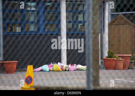 Parkstone, Poole, Dorset, UK Monday 15 April 2013. Pupils and teachers lay tributes following the tragic death of headmistress Mrs Ally Mullany at St Joseph’s Catholic Combined School at Parkstone who was tragically killed in a crash with a fire engine yesterday. The fire engine was on its way to an earlier fatal crash on the A35. Two children were injured and airlifted to hospital. Stock Photo